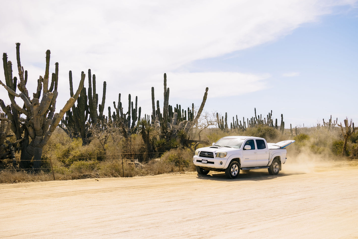 Exclusive Surf Lesson Tour Round Trip Transport on 4x4 Toyota Tacoma Vehicle.